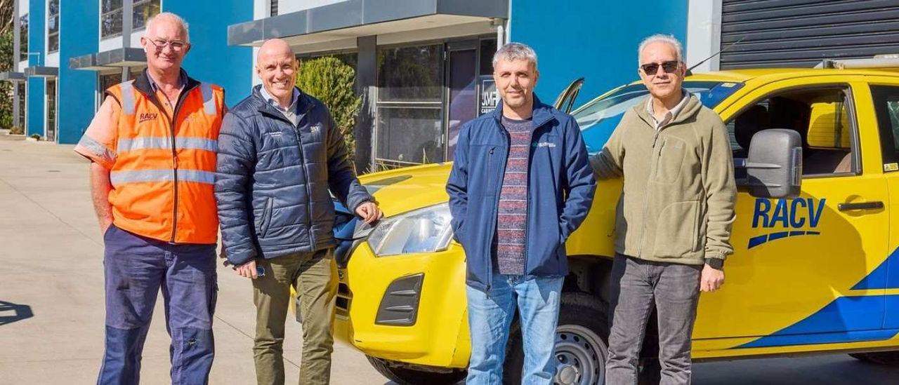 Four men standing in front of an RACV ERA patrol