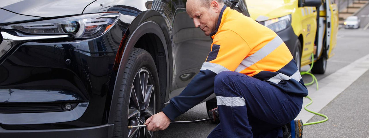 ERA patrol changing a tyre