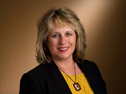 Headshot of board member Julie Green