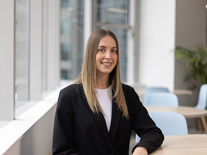 Professional headshot of RACV graduate Alex.