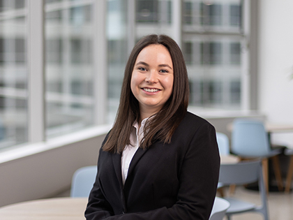 Professional headshot of RACV graduate Caitlin.