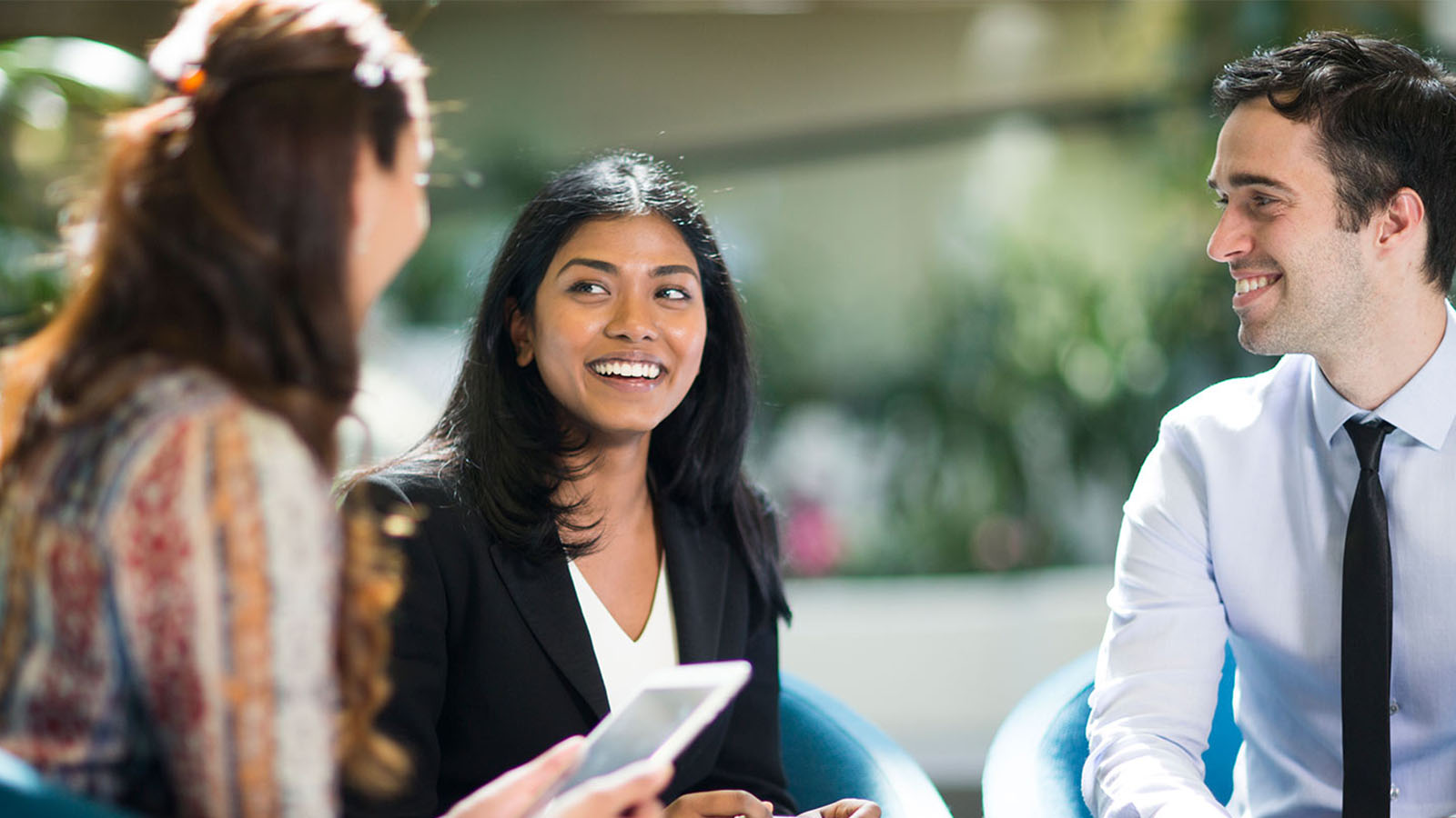 RACV staff members speaking with a community member.