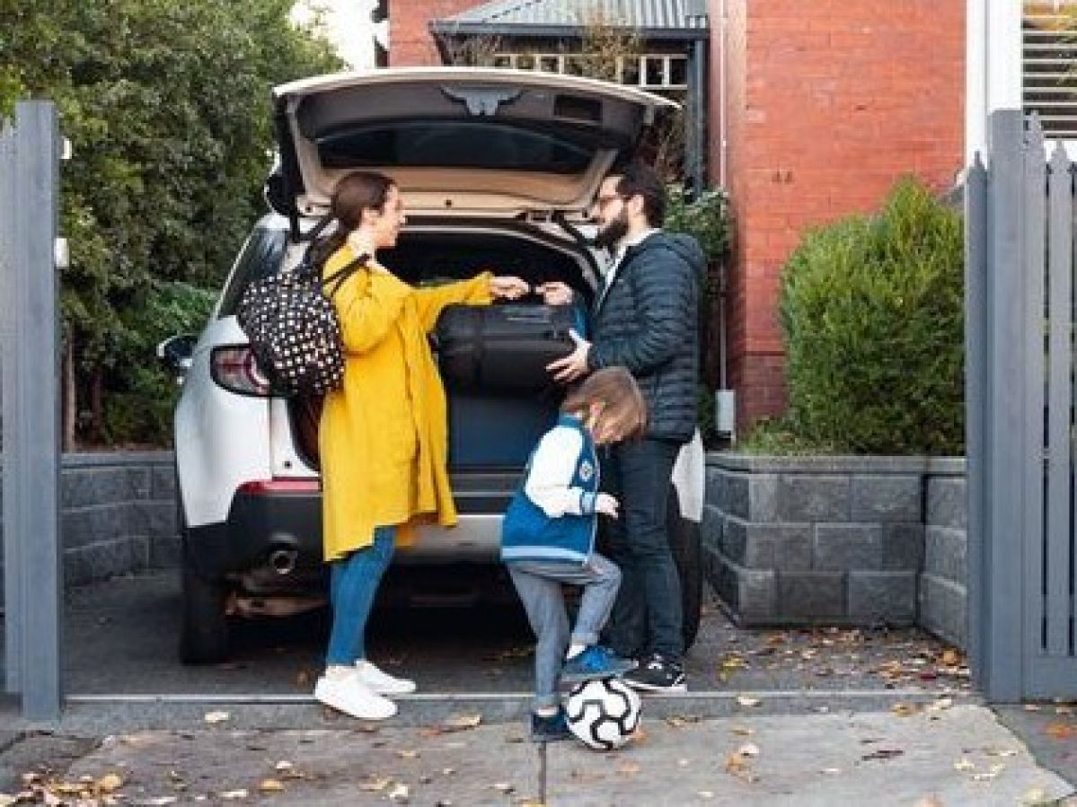 Family in driveway