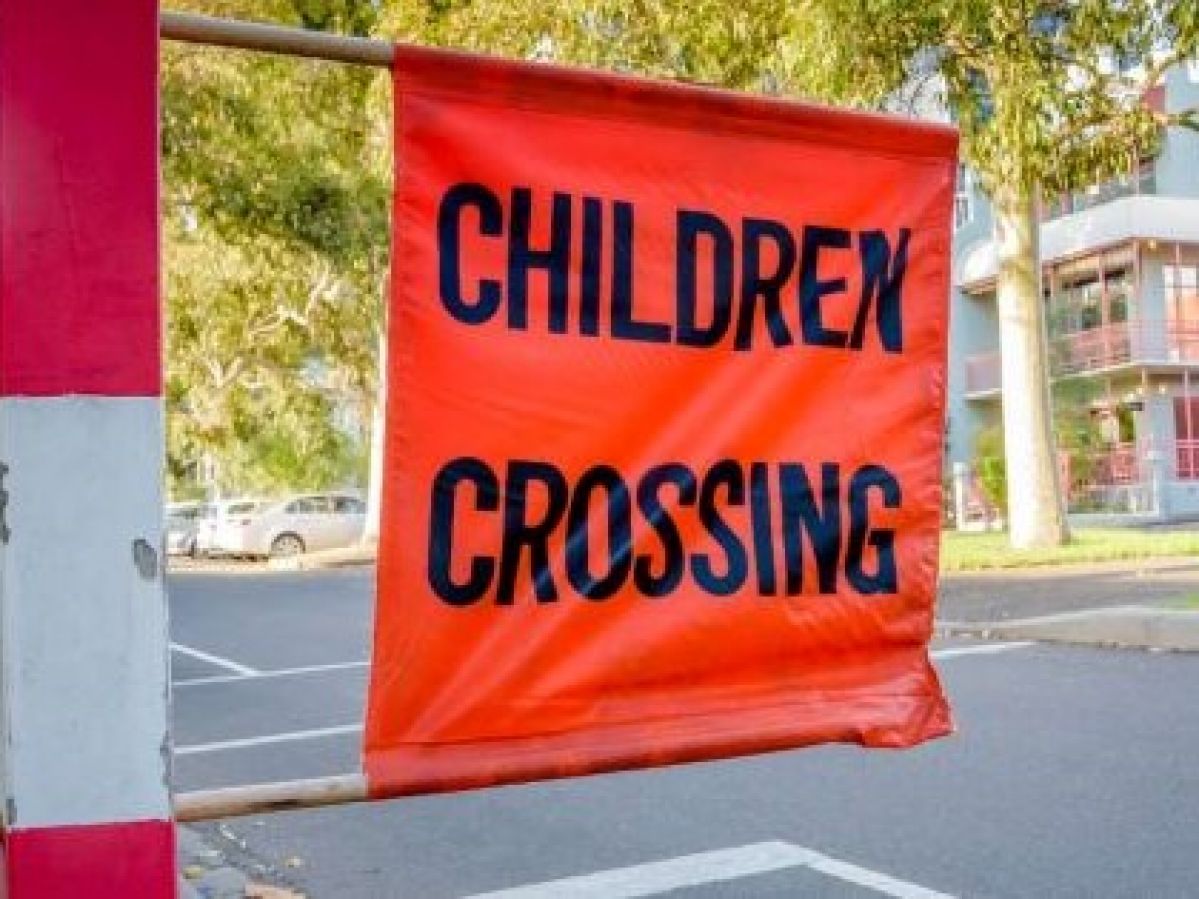 School children crossing sign