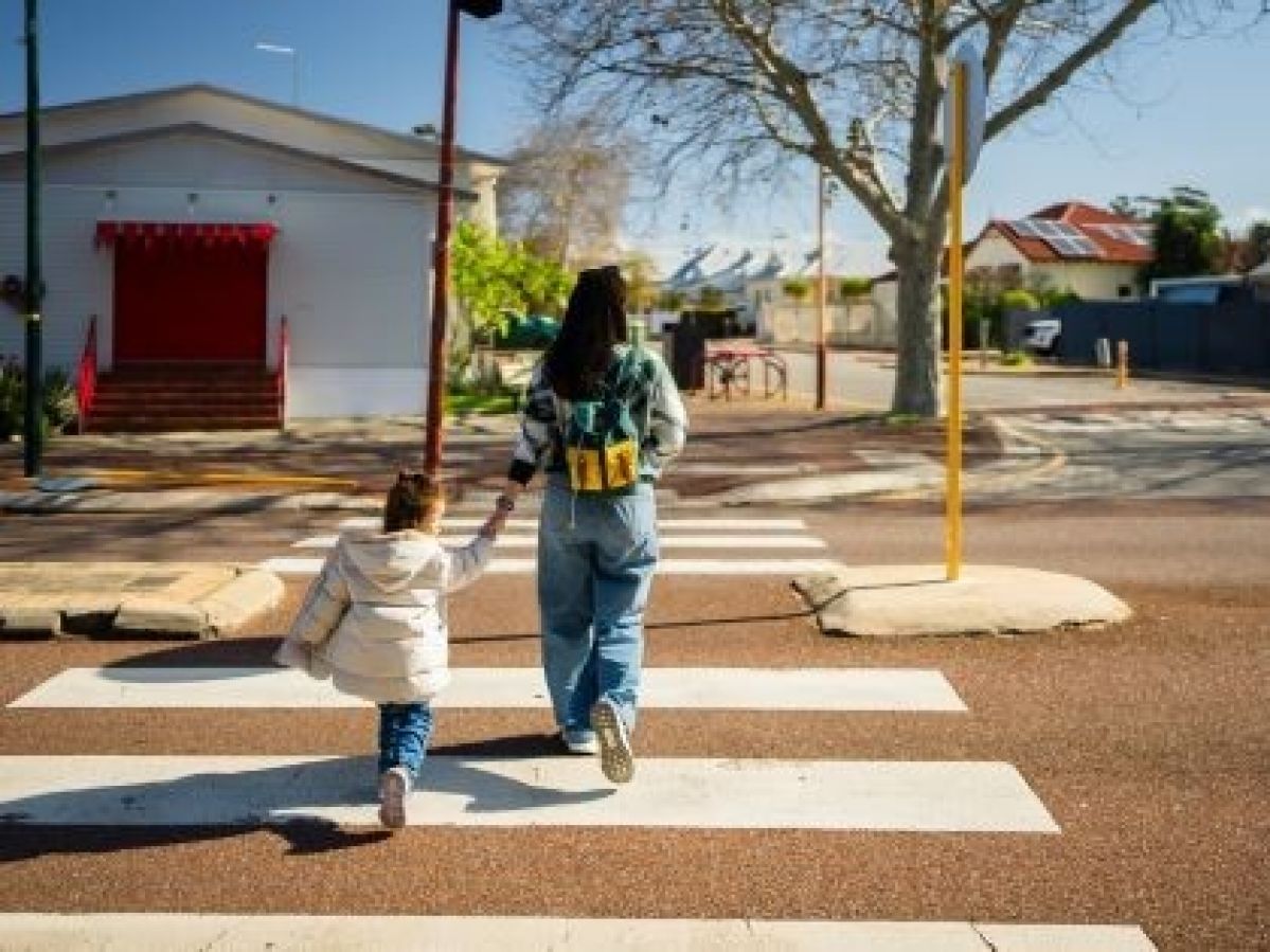 Mother and child using a school crossing
