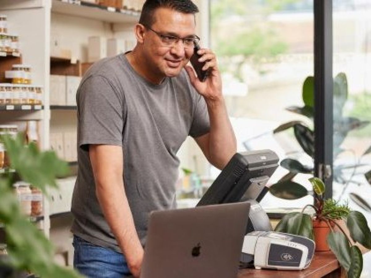Small business owner on phone