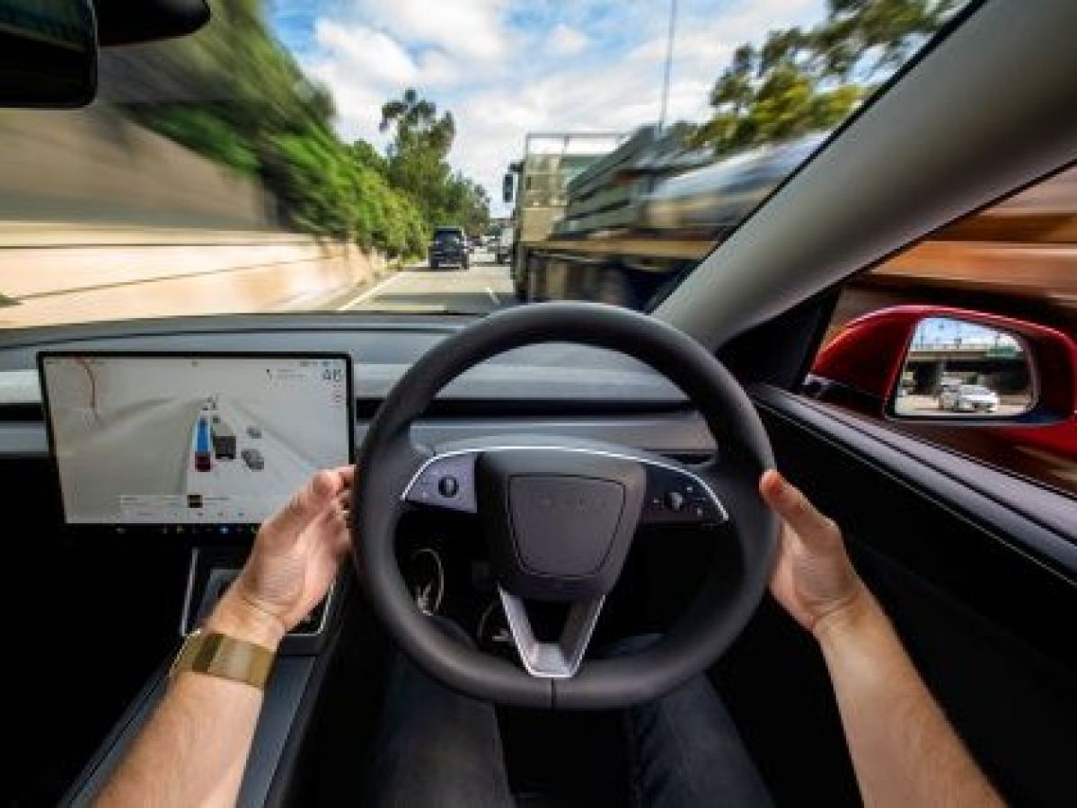 Tesla automated vehicle driving on a Victorian road.