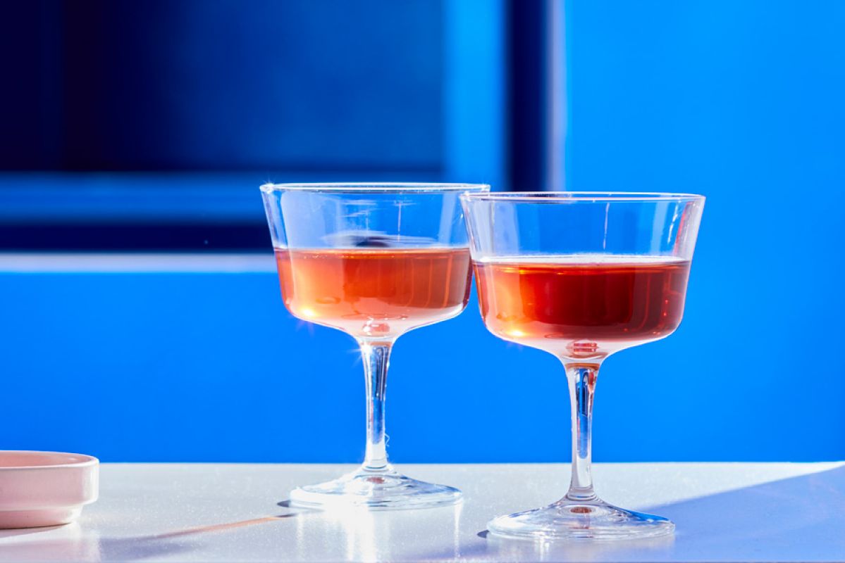 two martini cocktails on bench