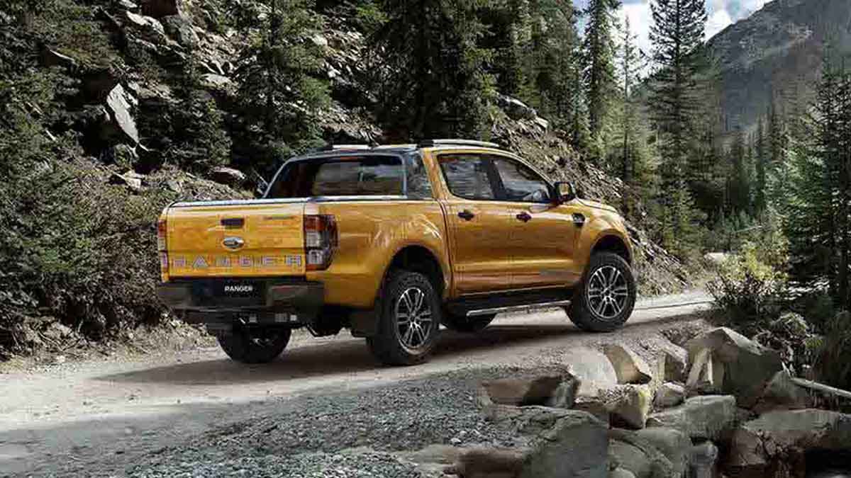 Gold Ford Ranger Wildtrak in forrest