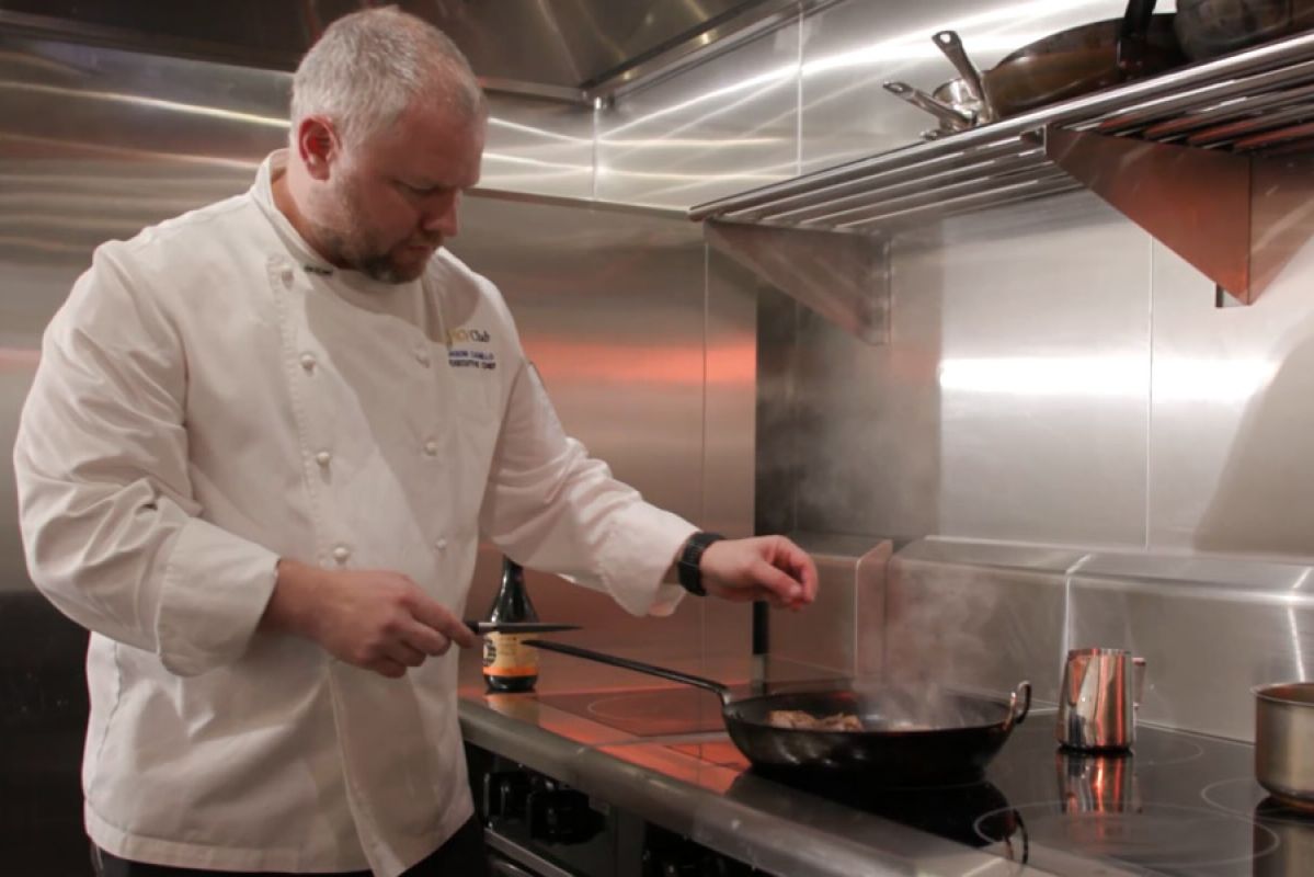 executive chef cooking on induction stove top