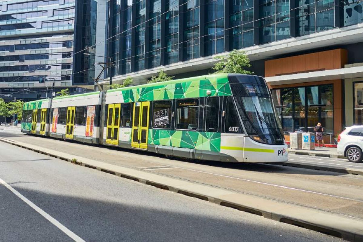 A tram travelling through docklands 