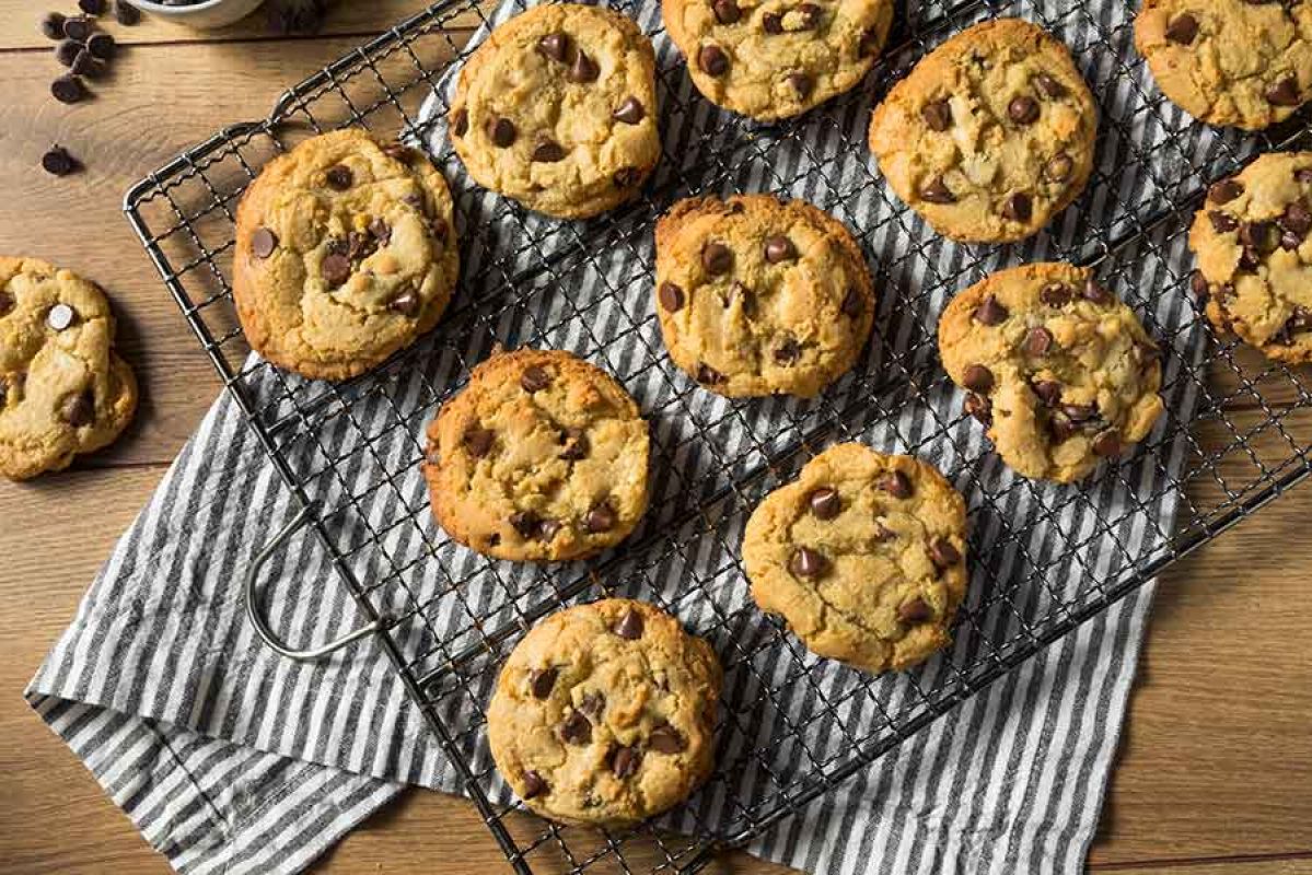 Salted Caramel Chocolate Chip Cookies on a bench cooling down