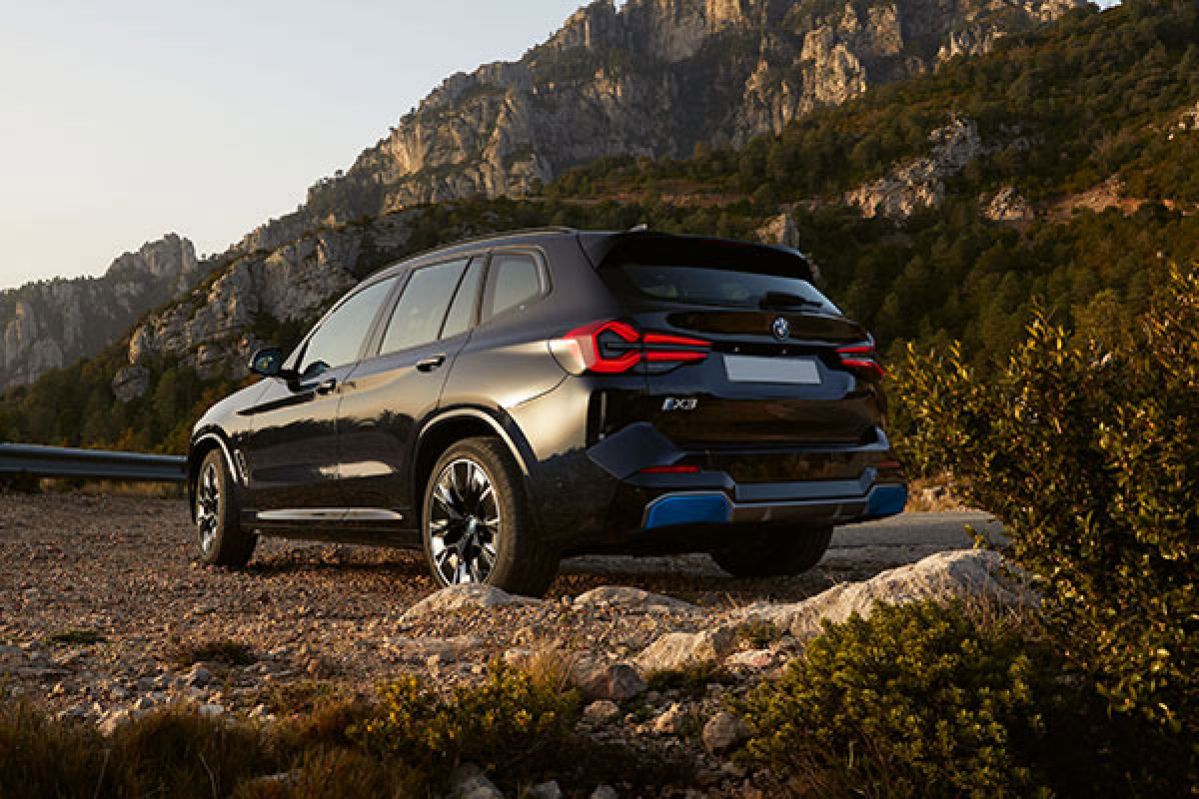 bmw ix3 with green background