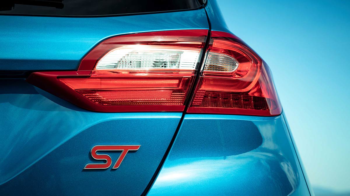 Close up of the tail light and ST badge of a blue Ford Fiesta ST 2020 car