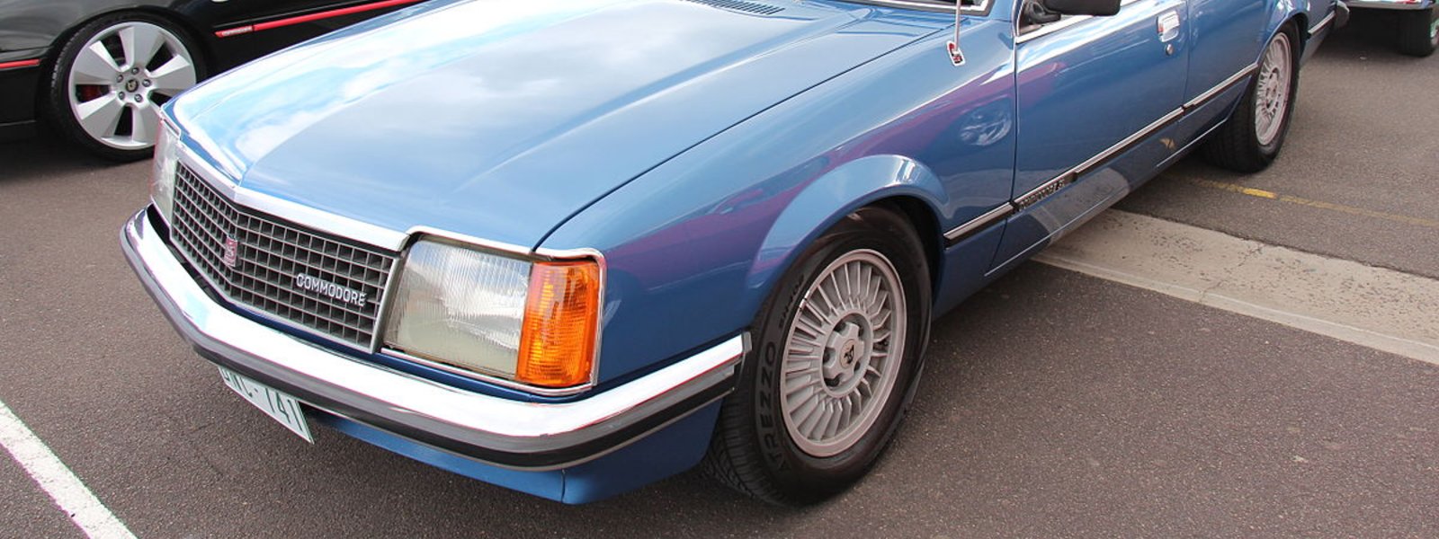blue holden vc starfire four commodore in parking lot