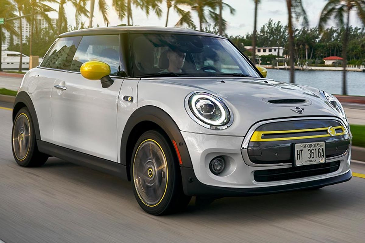 A Mini Electric hatch on the road.