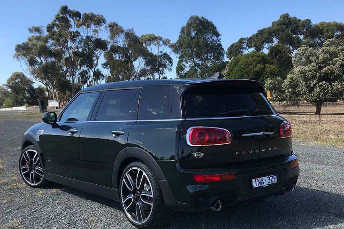 rear and side view of dark green Mini Clubman JCW 2019