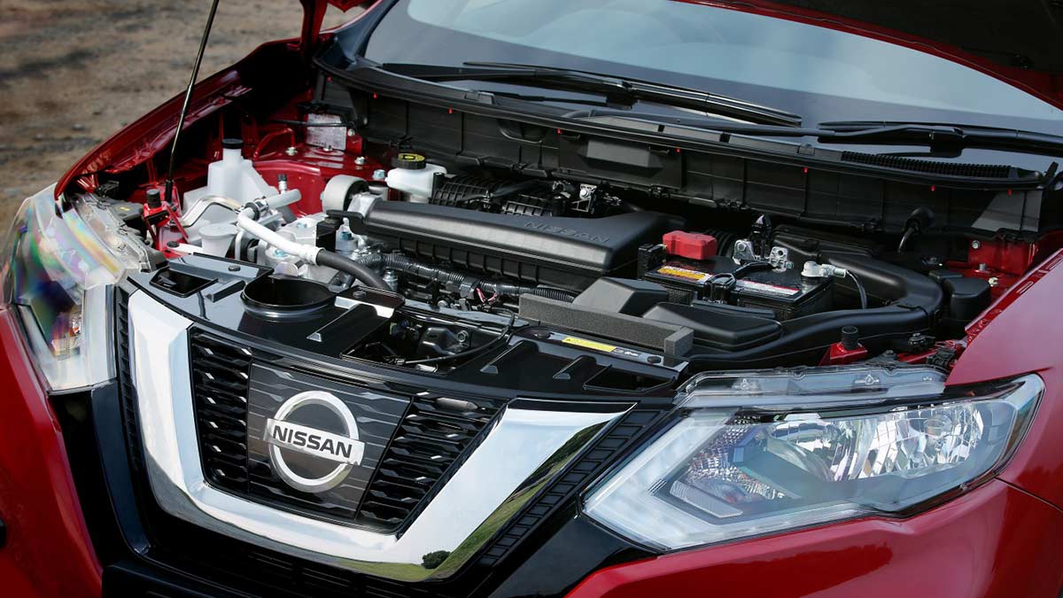 Engine bay of a red Nissan X-Trail 2017 car