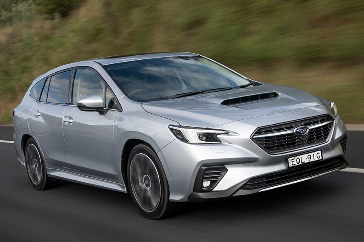 A silver Subaru WRX tS Sportswagon on the road.