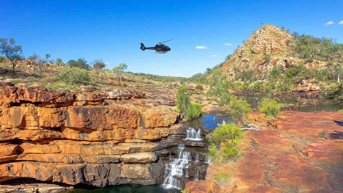 Take a scenic helicopter from your luxury cruise ship to Mitchell Falls in the Kimberley region. Image: Scenic Cruises 