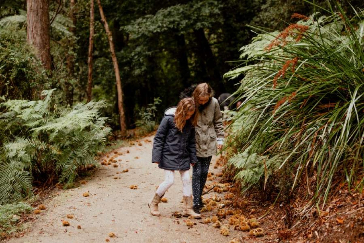 Two girls walking at Emerald Lake