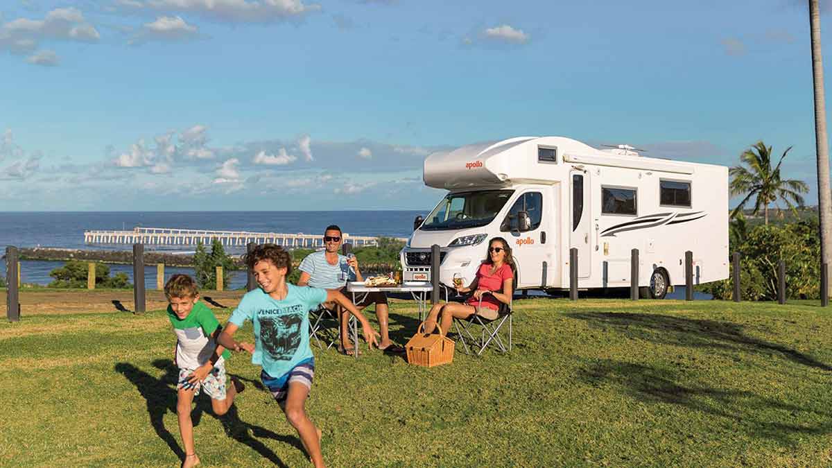 Family by the seaside with Apollo Motorhome