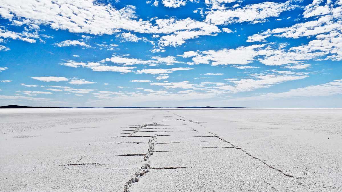 Surface of Lake Gairdner under a clouded sky
