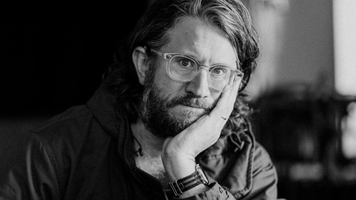 A black and white portrait photograph of Kristoffer Paulsen