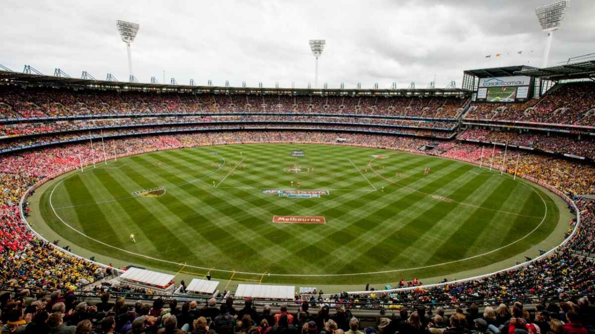 A packed crowd enjoying the boxing day test at the mcg