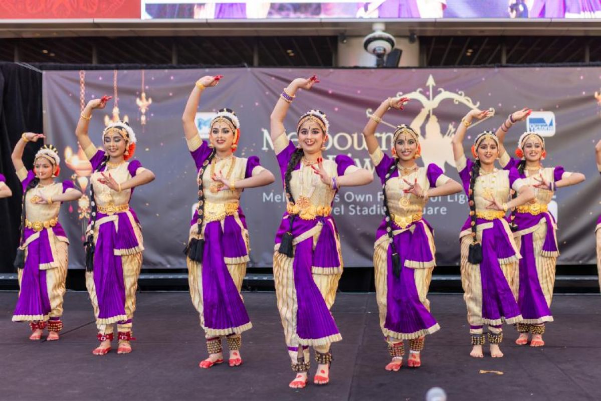 Indian women performing cultural dance at Diwali
