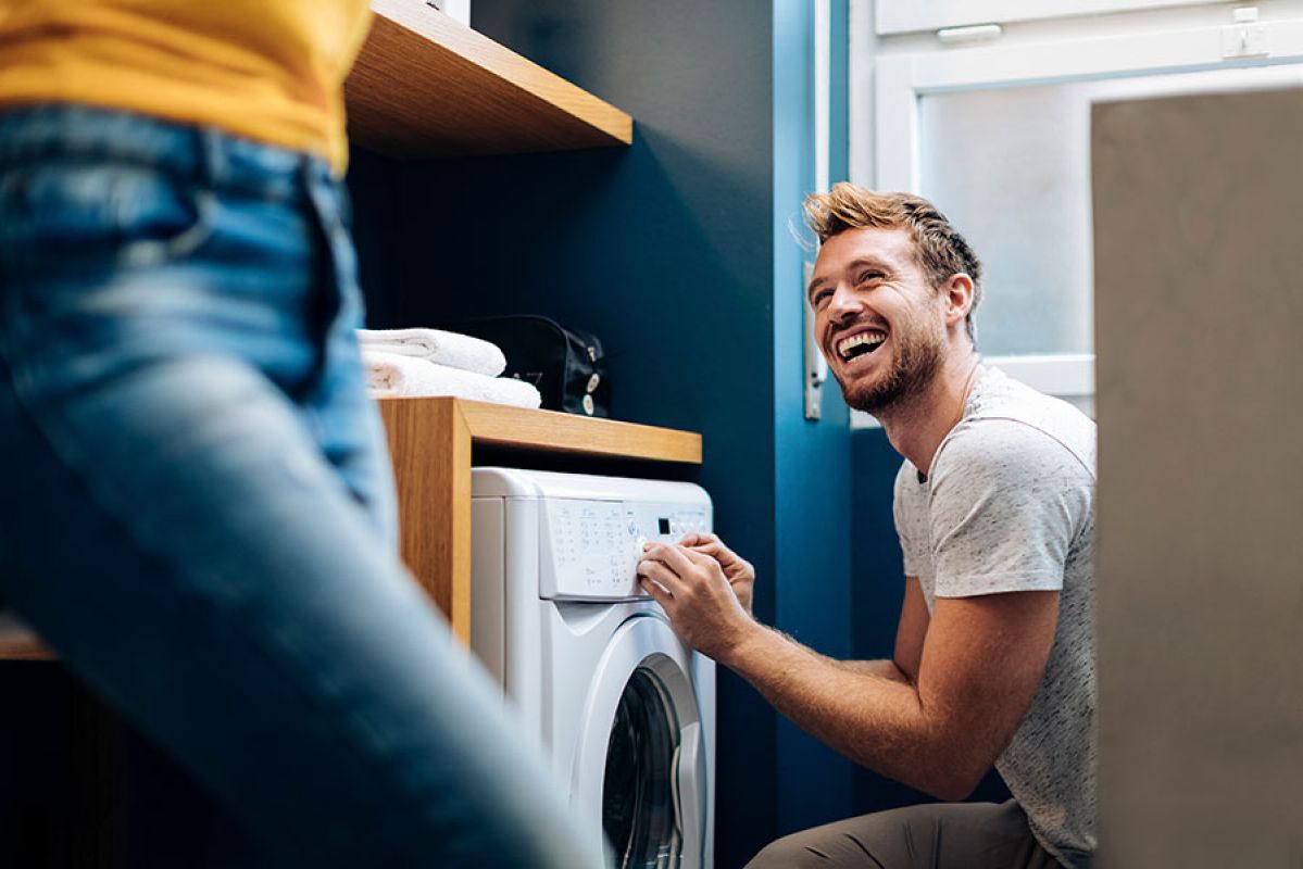 a nice laundry complete with clothes dryer
