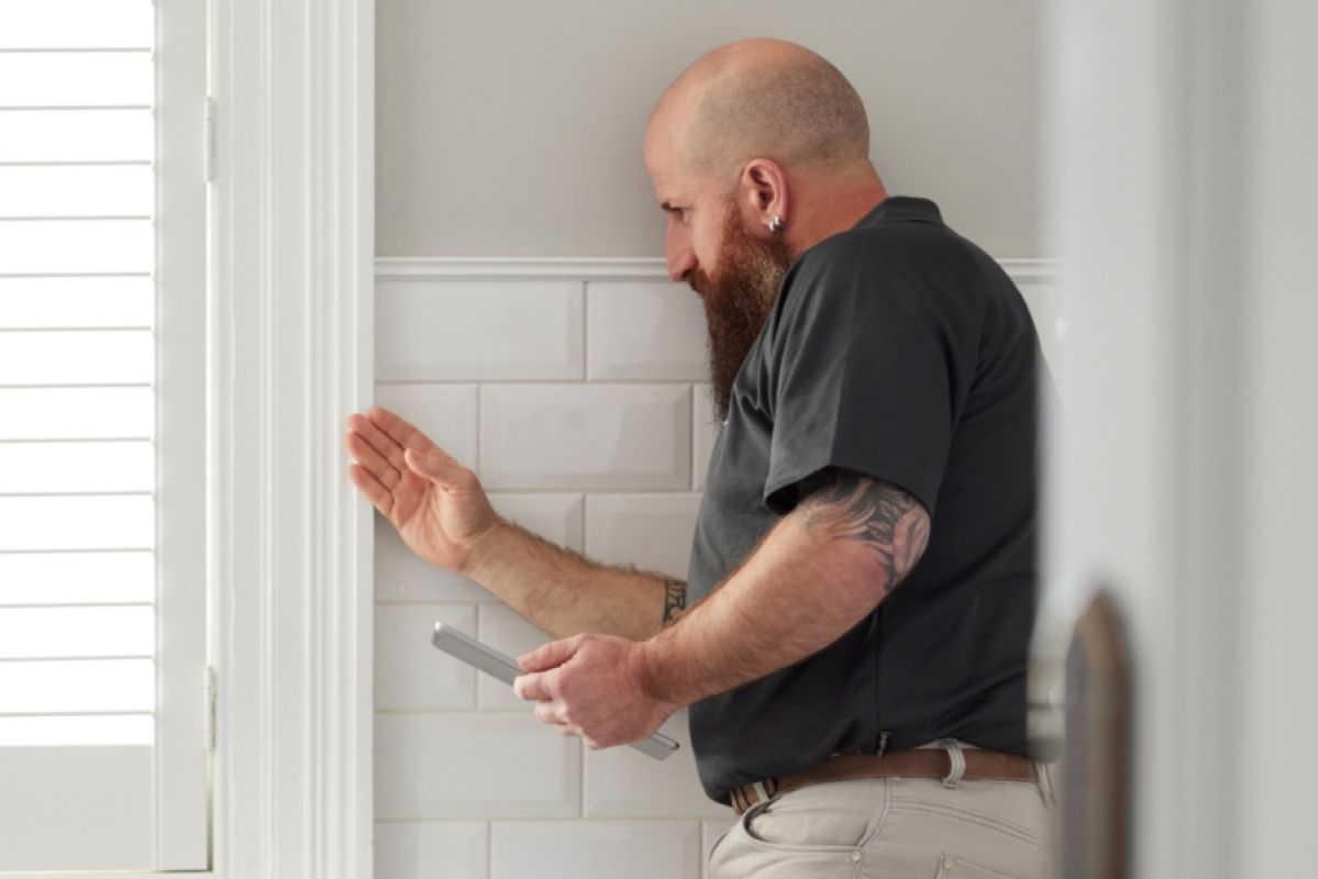 property inspector in bathroom