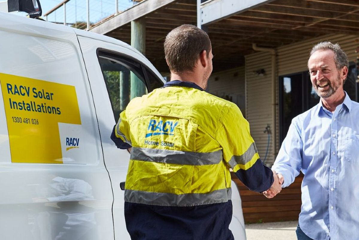 RACV Solar technician shaking hands with homeowner