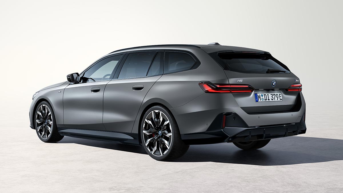Silver BMW i5 Touring electric wagon