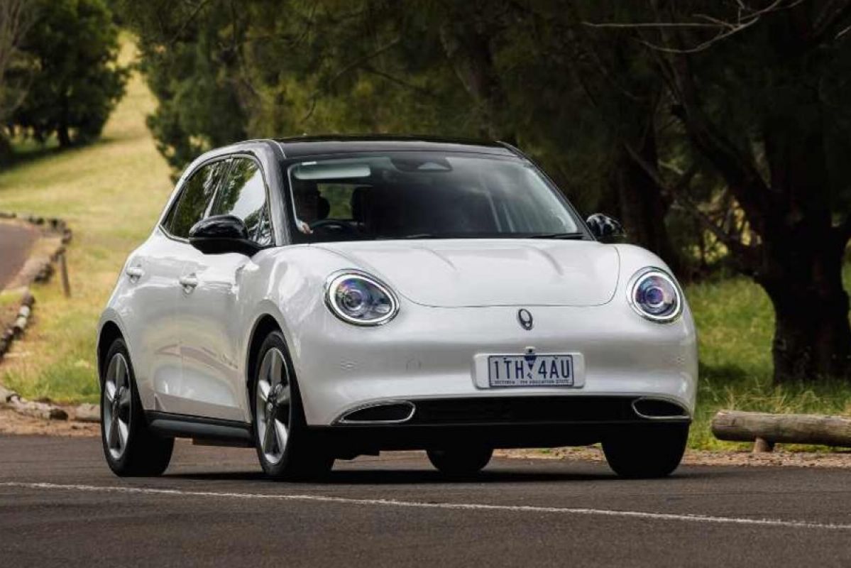 white GWM Ora driving on road