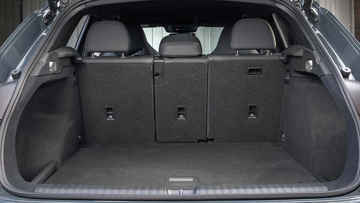 Cargo area of Cupra Terramar SUV with triple split-fold rear seat.