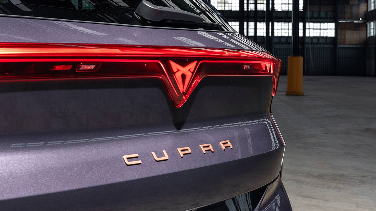 Large rear light bar and Cupra badging on rear of purple Cupra Terramar VZ SUV