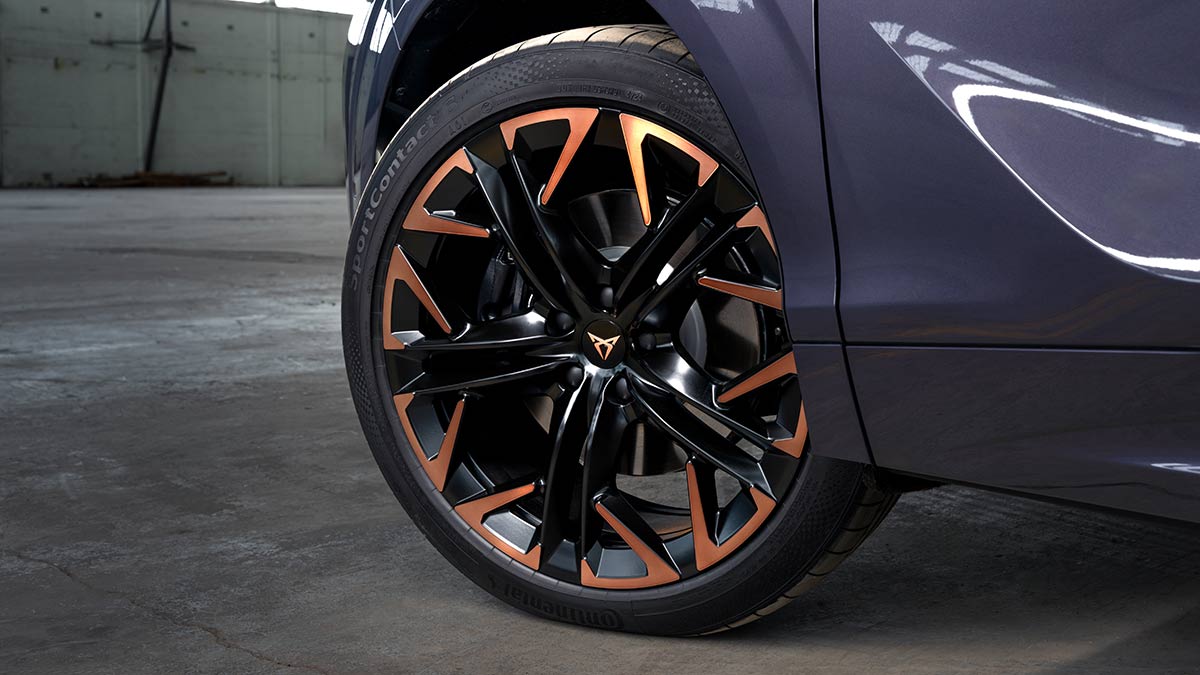 Large 19-inch black and copper alloy wheel fitted to purple Cupra Terramar medium SUV  