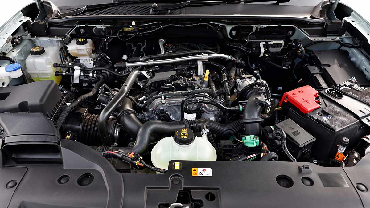 Engine bay of Ford Ranger PHEV showing 2.3-litre turbo-petrol engine and related components