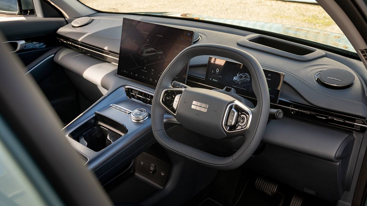 Steering wheel, digital display and large touchscreen for driver of Geely EX5 SUV
