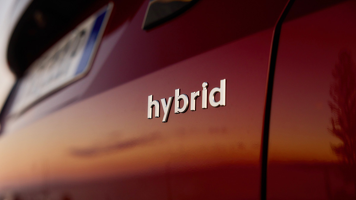 Hybrid badge on red Hyundai Tucson Premium N Line SUV