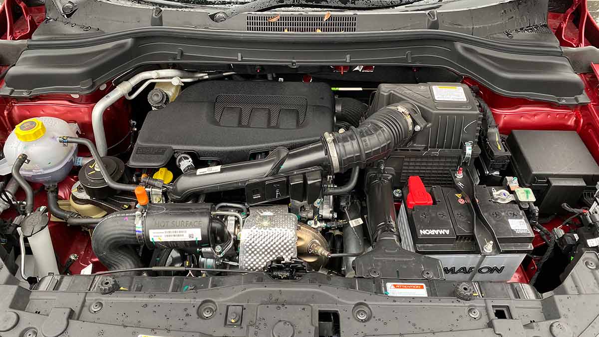 Three-cylinder turbo-petrol engine under bonnet of Mahindra XUV 3XO small SUV 