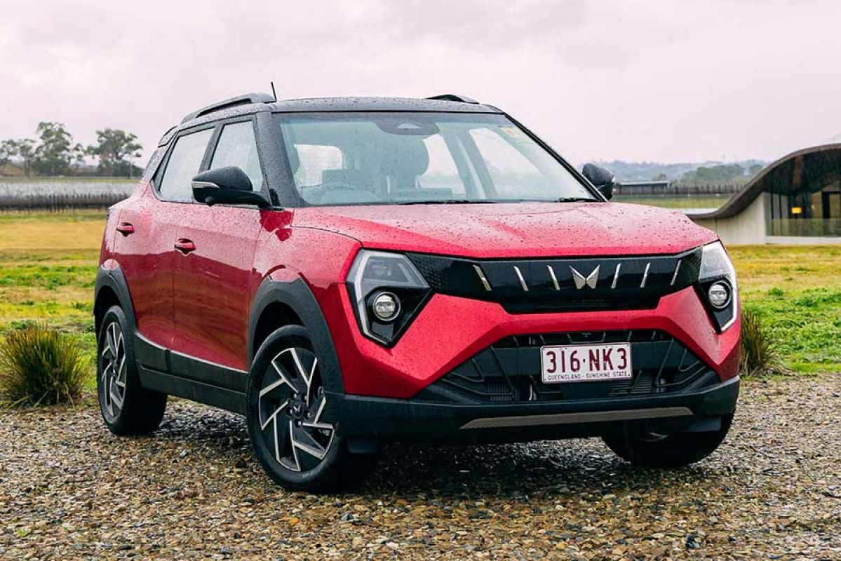 Red Mahindra XUV 3XO small SUV in carpark at vineyard in Victoria’s Yarra Valley