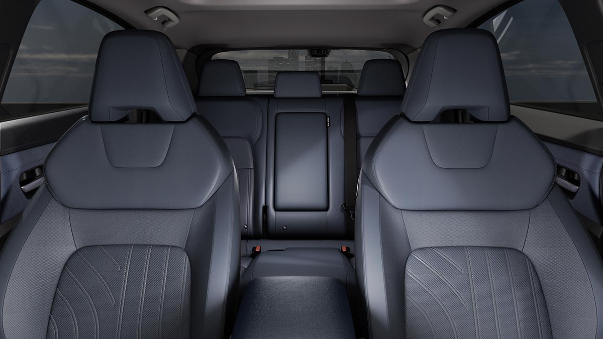 View of Nissan Ariya EV cabin with five seats in grey upholstery
