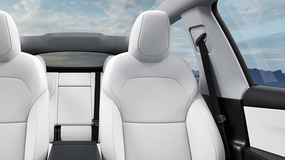 White seats and door trim plus panoramic sunroof in Tesla Model Y electric SUV