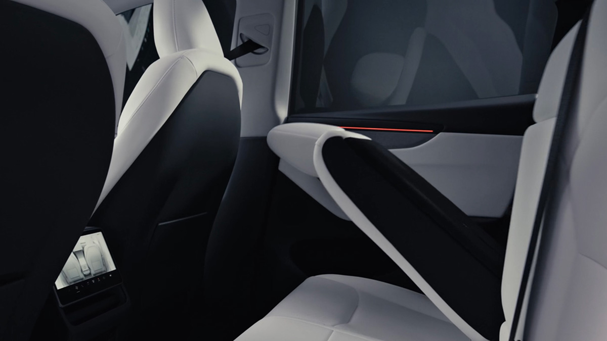 Rear seat split-fold in action in 2025 Tesla Model Y