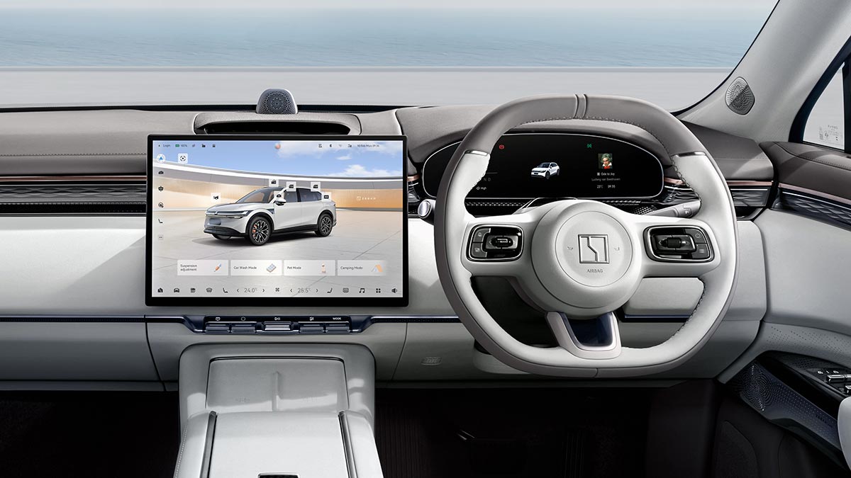 Cockpit of Zeekr 7X SUV with large centre touchscreen, row of lower buttons, digital instrument panel and multifunction steering wheel