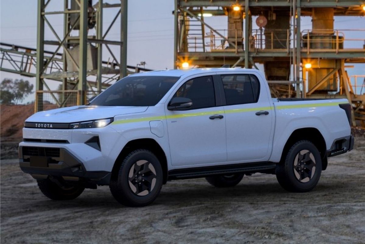 White electric Toyota Hilux on worksite