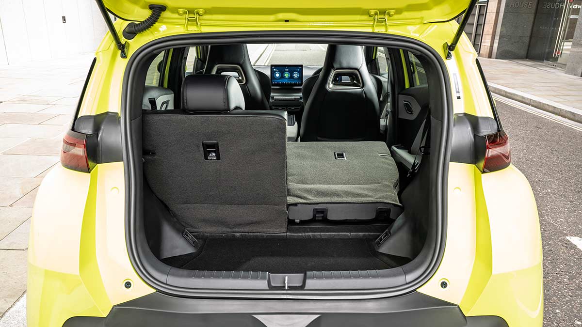 View into cargo area of BYD Atto 1 city hatch with rear seat folded.