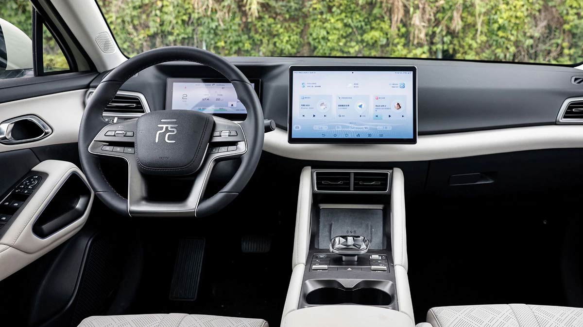 Dash and centre console of BYD Atto 2 small EV with large central rotating screen in horizontal position 